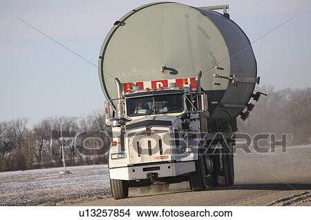 winter truck carrying fuel storage tank gravel View Large Photo Image Picture - winter truck carrying fuel storage tank gravel . Fotosearch