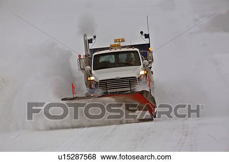 winter truck clearing snow off country road cold View Large Photo Image Stock Photo - winter truck clearing snow off country road cold. Fotosearch