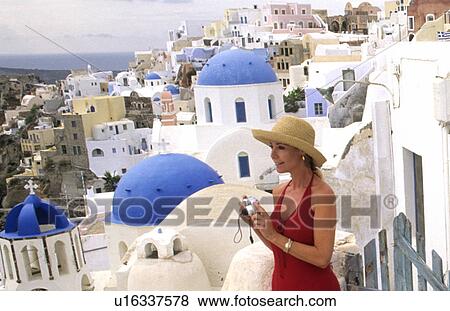 woman athens greece tourist white buildings oia athens View Large Photo Image Stock Photo - woman athens greece tourist white buildings oia athens. Fotosearch