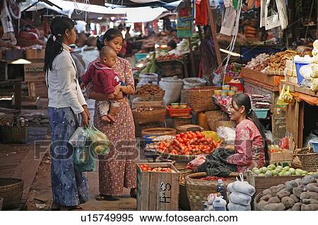 Stock Photography -  woman baby food people border person women north . Fotosearch