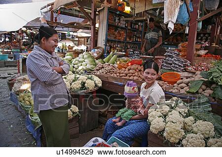 Stock Photo -  woman baby food people child border person . Fotosearch