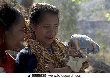 woman baby women timor leste females admiring View Large Photo Image Stock Photography - woman baby women timor leste females admiring. Fotosearch