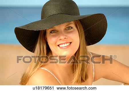 Stock Image -  woman beach person 20-25 years 25-30 attractive. Fotosearch