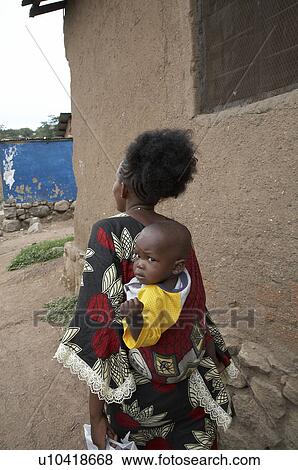 Stock Photo -  woman child children kid women tanzania mother. Fotosearch