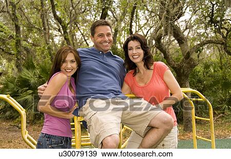 woman couple man two friends playing outdoors mr View Large Photo Image Stock Photo - woman couple man two friends playing outdoors mr . Fotosearch