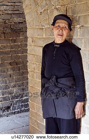 woman female standing in chamber inside great wall View Large Photo Image Stock Image - woman female standing in chamber inside great wall. Fotosearch