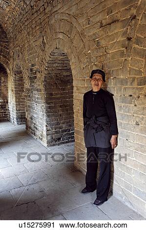 Stock Image -  woman female standing in chamber inside great . Fotosearch