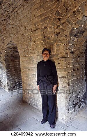 woman female standing in chamber inside great View Large Photo Image Stock Image - woman female standing in chamber inside great . Fotosearch