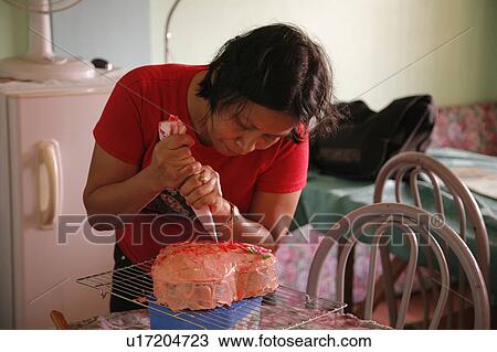 woman food people person women making valentines View Large Photo Image Stock Image - woman food people person women making valentines . Fotosearch