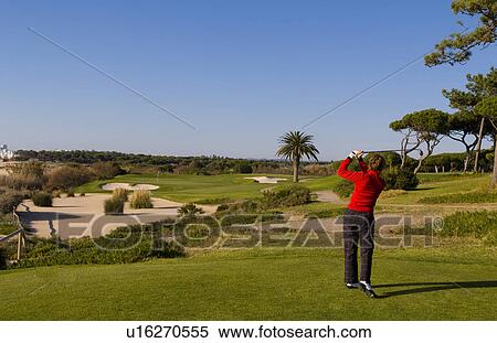 woman golf golfing expensive ocean club in lago View Large Photo Image Stock Photography - woman golf golfing expensive ocean club in lago . Fotosearch
