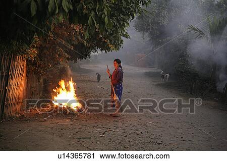 Stock Image -  woman people border person fire myanmar sweeping. Fotosearch