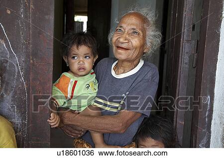 Stock Photograph -  woman people child children women timor leste . Fotosearch