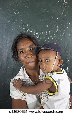 Stock Photography -  woman people child children women timor leste. Fotosearch