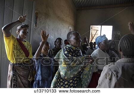 Stock Image -  woman people person women tanzania singing mass. Fotosearch