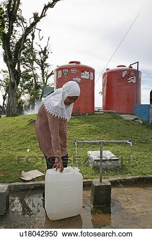 woman water people person indonesia collecting View Large Photo Image Stock Image - woman water people person indonesia collecting . Fotosearch