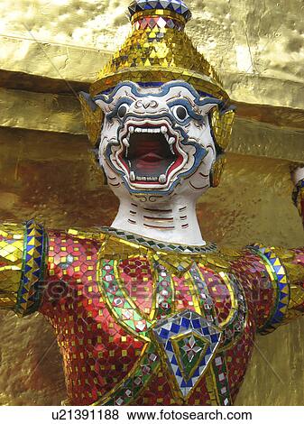 Stock Photo -  asia demon guards bottom gilded chedi or stupa. Fotosearch