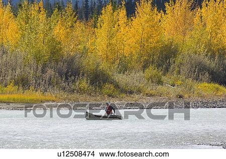 background water man single canoe boating river View Large Photo Image Picture - background water man single canoe boating river. Fotosearch