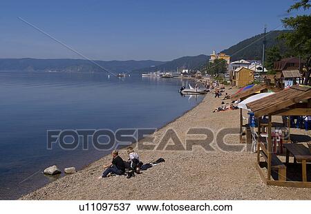 beach people beautiful relaxed shore boats View Large Photo Image Stock Photo - beach people beautiful relaxed shore boats . Fotosearch