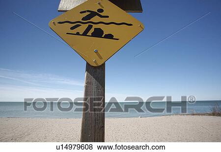 beach water art swimmers warning sign lake shore View Large Photo Image Stock Photo - beach water art swimmers warning sign lake shore. Fotosearch