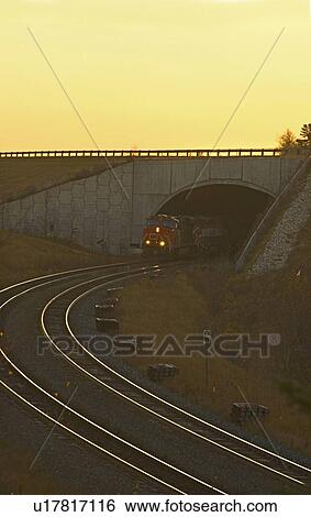 Stock Photograph -  canadian national freight train traveling tunnel. Fotosearch