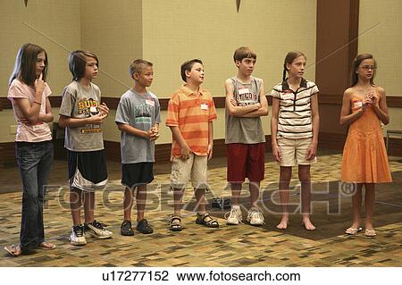children kids boys girls young standing looking View Large Photo Image Stock Image -  children kids boys girls young standing looking. Fotosearch