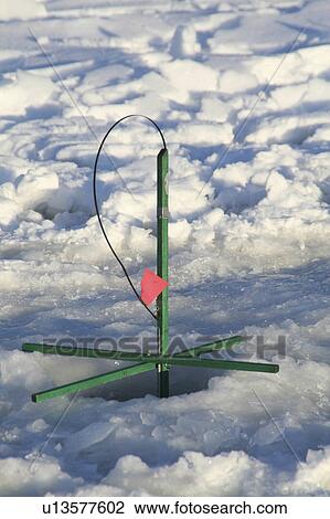 Stock Image -  design sport winter ice fishing highland lake. Fotosearch