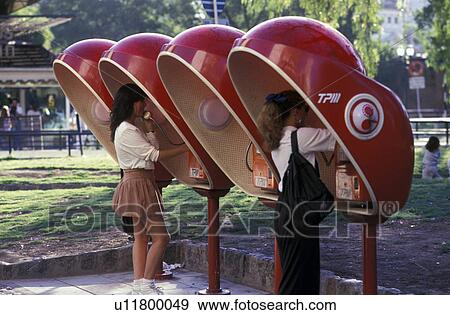Stock Photo - domestyle red public telephones typical buenos aires argentina. Fotosearch