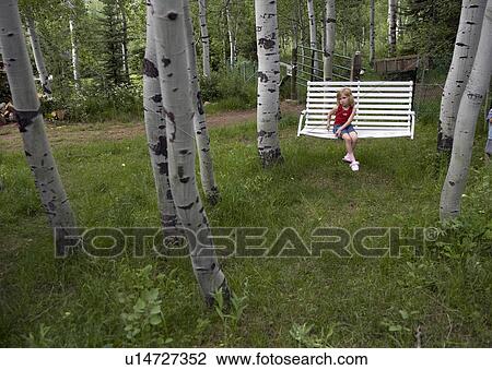 Stock Image -  family girl child young in red shirt jean shorts. Fotosearch