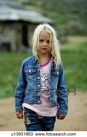 family girl kid young walks through ranch in res View Large Photo Image Stock Image - family girl kid young walks through ranch in res. Fotosearch