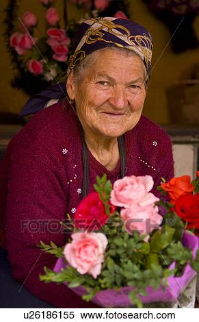 Stock Photography -  flowers shopping old lady babushkas selling . Fotosearch