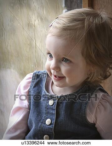 Picture -  girl child children kid pretty posing window. Fotosearch