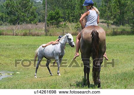 girl horse children camp in florida for kids View Large Photo Image Stock Photo - girl horse children camp in florida for kids. Fotosearch