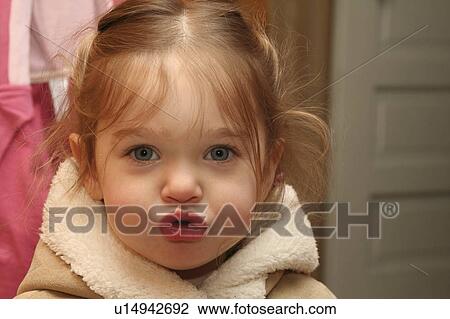Stock Image -  girl kylan stone 2 year old wearing jacket mr. Fotosearch