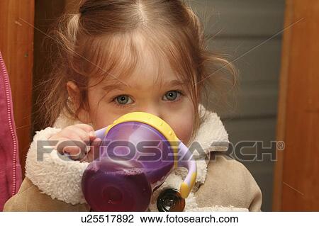 girl kylan stone 2 year old wearing jacket sippy View Large Photo Image Stock Image -  girl kylan stone 2 year old wearing jacket sippy. Fotosearch