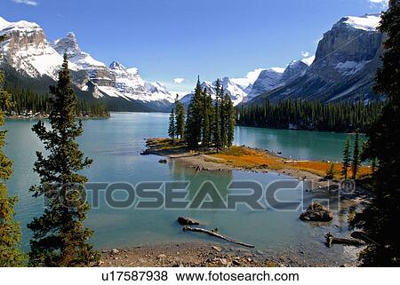 Stock Photo -  horozontal scenic view maligne lakes famous snow. Fotosearch