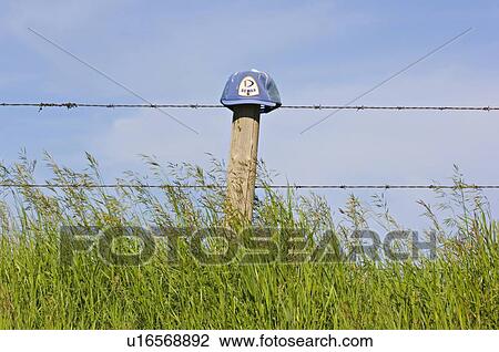 Stock Image -  horozontal shot hat placed fence post concept. Fotosearch