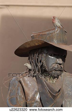 Stock Image -  house male female nest chin iron sculpture sante. Fotosearch
