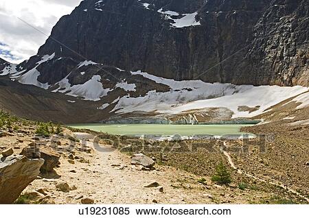 Stock Photography -  nature angel berg lake tourist exploring its ice. Fotosearch