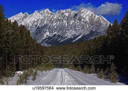 nature winter snow covered road in leading ridge View Large Photo Image Picture -  nature winter snow covered road in leading ridge. Fotosearch