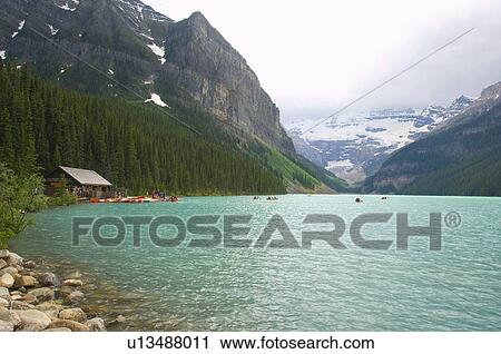 people house boat tourist renting canoes around View Large Photo Image Stock Image - people house boat tourist renting canoes around. Fotosearch