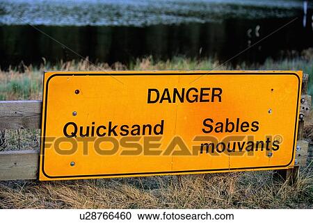 people large sign warning quicksand in area park View Large Photo Image Stock Image - people large sign warning quicksand in area park. Fotosearch