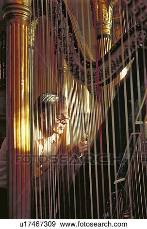 Stock Photo -  people person bob leightoner collects repairs. Fotosearch