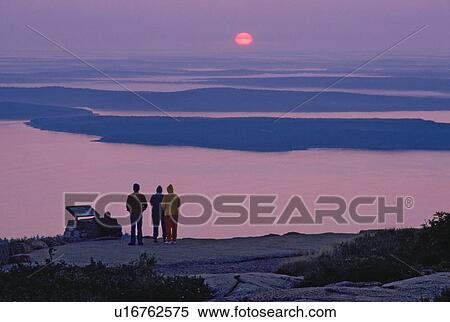 people summer person first sunrise in usa acadia View Large Photo Image Stock Photography - people summer person first sunrise in usa acadia. Fotosearch