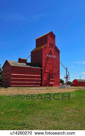 red historic grain elevator in town nanton View Large Photo Image Stock Image - red historic grain elevator in town nanton. Fotosearch