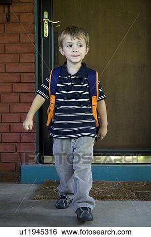 Stock Photograph -  school young boy wearing backpack knapsack heads. Fotosearch