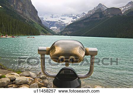 Stock Photo -  selective focus shot binocular viewer lake . Fotosearch