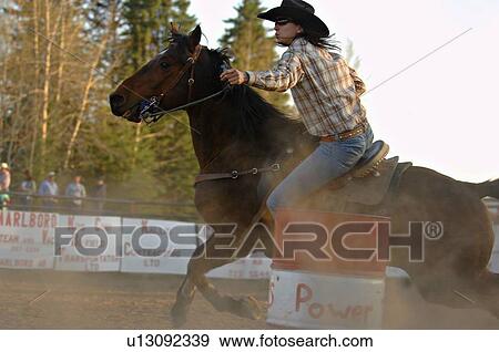 Stock Photo -  sport horse barrel racing comperors powers rodeo. Fotosearch