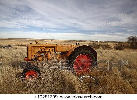 spring art piled abandoned tractor vehicles farm View Large Photo Image Stock Photo - spring art piled abandoned tractor vehicles farm. Fotosearch