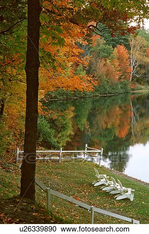 Stock Image -  summer cottage adirondack chairs vermont autumn. Fotosearch