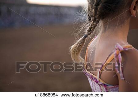Picture -  summer girl child young girls pony tail catches. Fotosearch